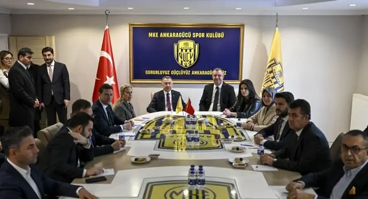 Representatives of MKE Ankaragücü Spor Kulübü meeting around a conference table with club branding.