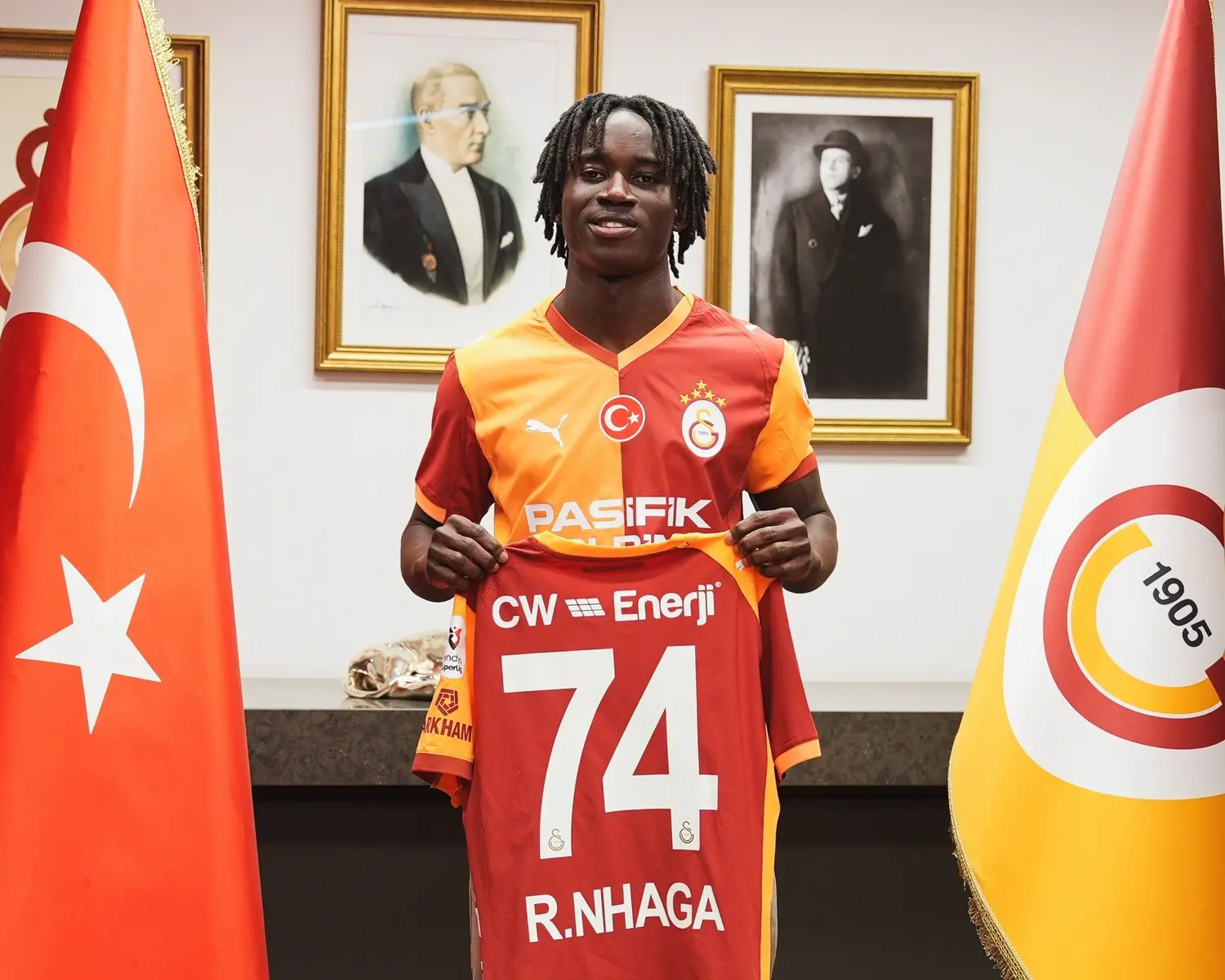 Renato Nhaga posing with his number 74 Galatasaray jersey